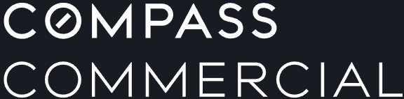 Compass Commercial logo on black background.