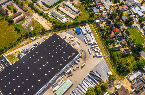 Aerial view of large industrial warehouse complex.